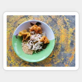 Thai street food. Asian yellow egg noodle with chicken and shrimp on cement background. Sticker